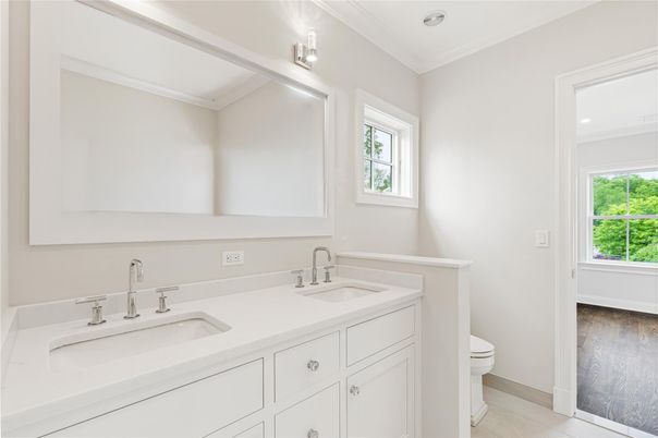 Bathroom, Dual Sink Vanities, Interior, Recessed Lighting, Wood Texture Flooring