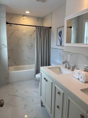 Bathroom, Dual Sink Vanities, Interior, Marble, Marble Walls, Recessed Lighting