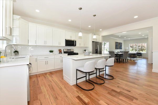 Dining room, Interior, Kitchen, Pendant Lights, Recessed Lighting, Stainless Steel Appliances, Wood Texture Flooring