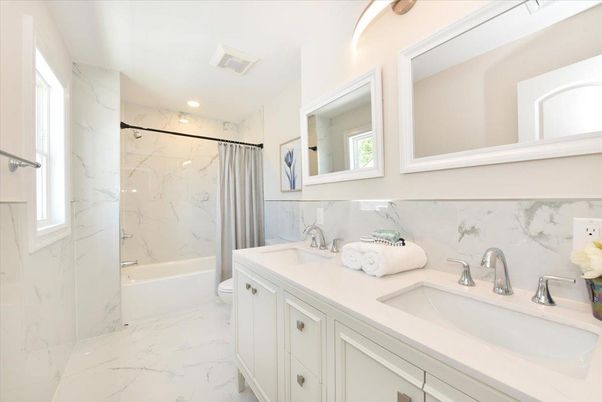 Bathroom, Dual Sink Vanities, Interior, Marble, Marble Walls, Recessed Lighting