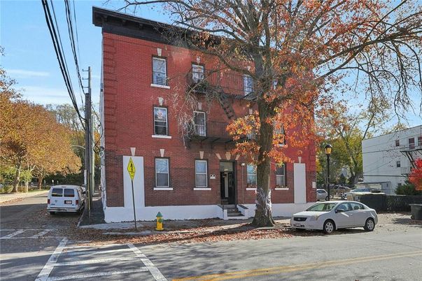 Exterior, Facade, Brick Facade, Condo Building