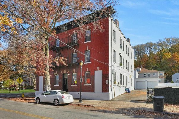 Exterior, Facade, Brick Facade, Condo Building