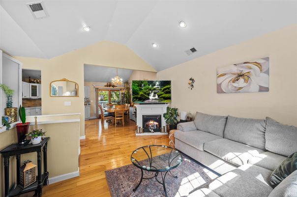 Chandelier, Dining room, Fireplace, Interior, Living room, Recessed Lighting, Wood Texture Flooring