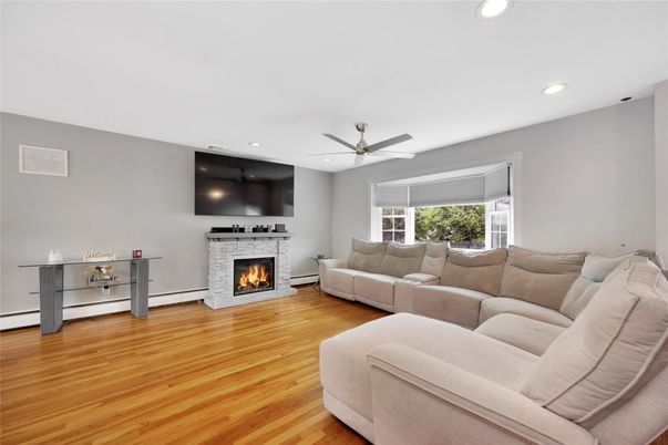 Fireplace, Interior, Living room, Recessed Lighting, Wood Texture Flooring