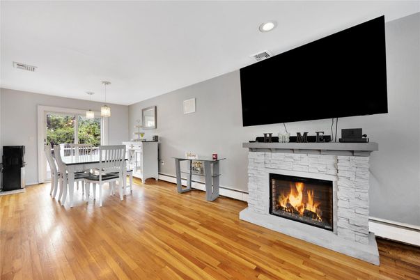 Dining room, Fireplace, Interior, Pendant Lights, Recessed Lighting, Wood Texture Flooring