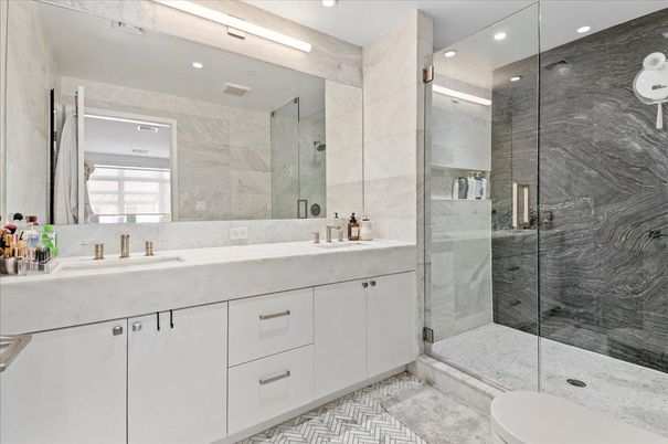 Bathroom, Dual Sink Vanities, Glass Shower, Interior, Marble Walls, Recessed Lighting