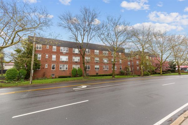 Exterior, Facade, Brick Facade, Condo Building