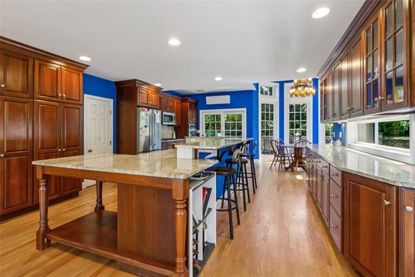 Chandelier, Dining room, Interior, Kitchen, Recessed Lighting, Stainless Steel Appliances, Wood Texture Flooring