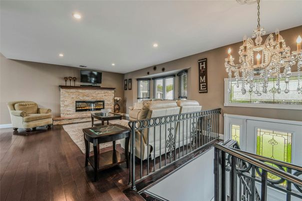 Chandelier, Fireplace, Interior, Living room, Recessed Lighting, Wood Texture Flooring