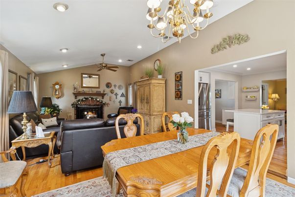 Chandelier, Dining room, Fireplace, Interior, Kitchen, Living room, Recessed Lighting, Wood Texture Flooring