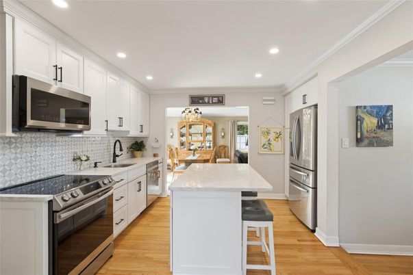 Interior, Kitchen, Recessed Lighting, Stainless Steel Appliances, Wood Texture Flooring