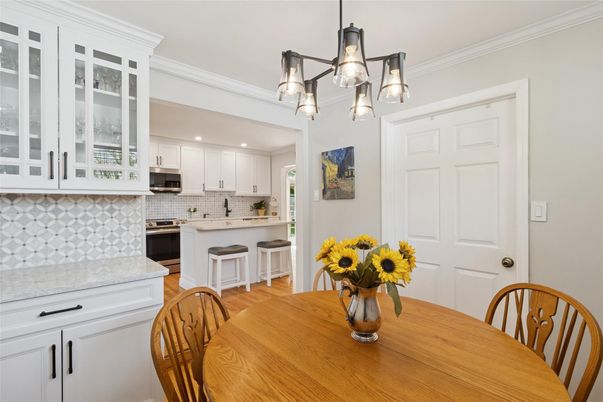 Dining room, Interior, Kitchen, Recessed Lighting, Stainless Steel Appliances, Wood Texture Flooring