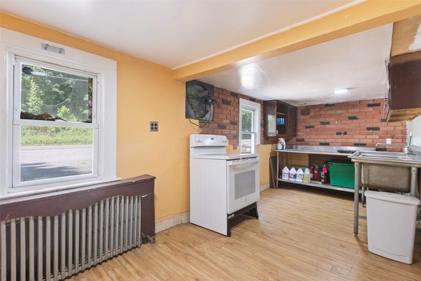 Interior, Kitchen, Recessed Lighting, Stone Walls, Wood Texture Flooring
