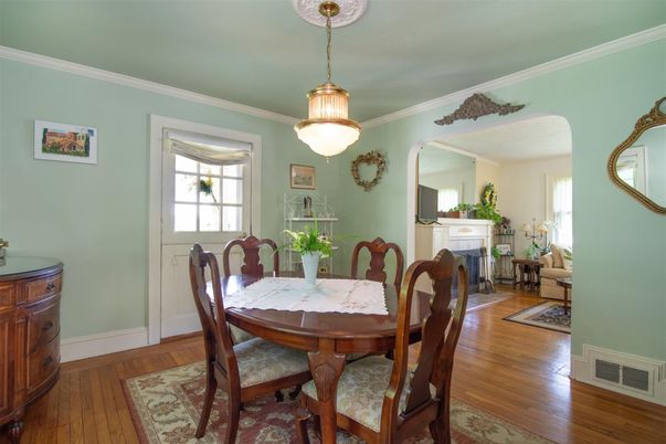 Dining room, Fireplace, Interior, Pendant Lights, Wood Texture Flooring