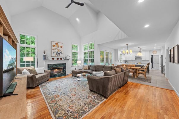 Dining room, Fireplace, Interior, Living room, Pendant Lights, Recessed Lighting, Wood Texture Flooring