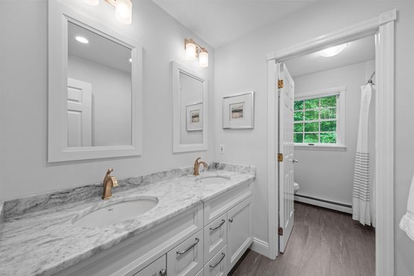 Bathroom, Dual Sink Vanities, Interior, Recessed Lighting, Wood Texture Flooring
