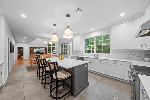 Chandelier, Fireplace, Interior, Kitchen, Living room, Pendant Lights, Recessed Lighting, Wood Texture Flooring