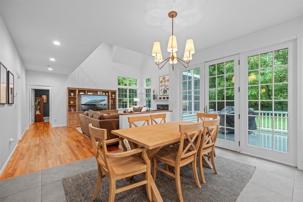 Chandelier, Dining room, Fireplace, Interior, Living room, Recessed Lighting, Wood Texture Flooring