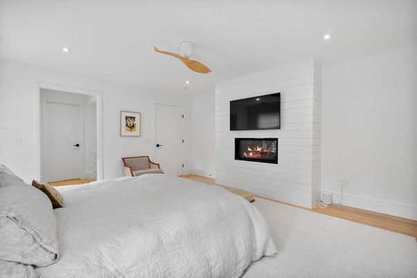 Bedroom, Fireplace, Interior, Recessed Lighting, Wood Texture Flooring