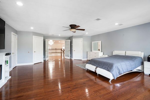 Bedroom, Fireplace, Interior, Recessed Lighting, Wood Texture Flooring