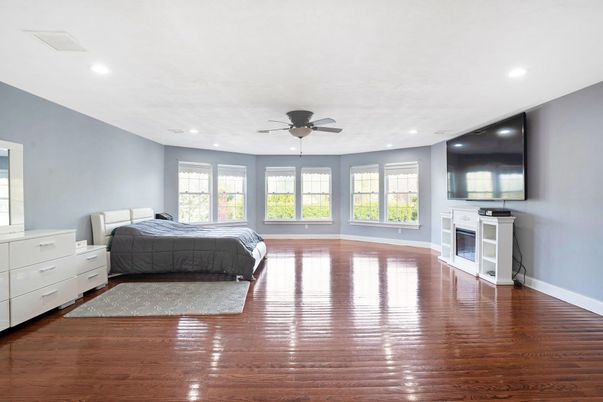 Bedroom, Fireplace, Interior, Recessed Lighting, Wood Texture Flooring