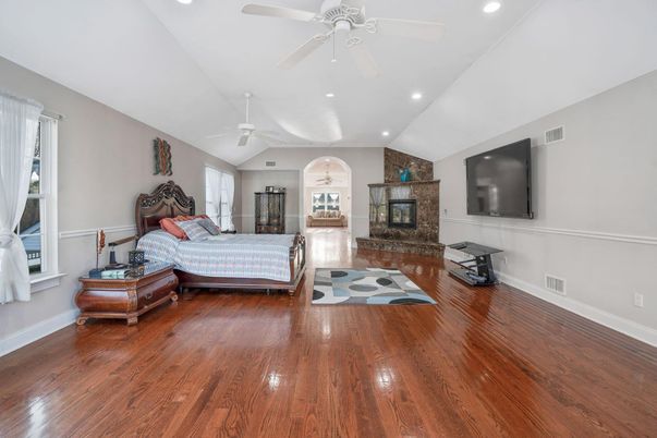 Bedroom, Fireplace, Interior, Recessed Lighting, Wood Texture Flooring