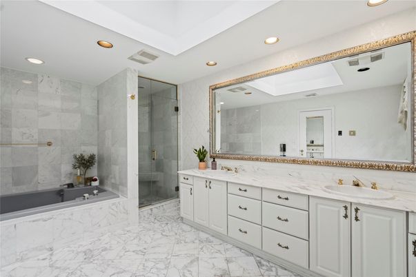 Bathroom, Dual Sink Vanities, Glass Shower, Interior, Marble, Marble Walls, Recessed Lighting