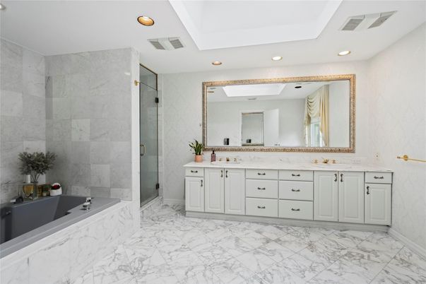 Bathroom, Dual Sink Vanities, Glass Shower, Interior, Marble, Marble Walls, Recessed Lighting