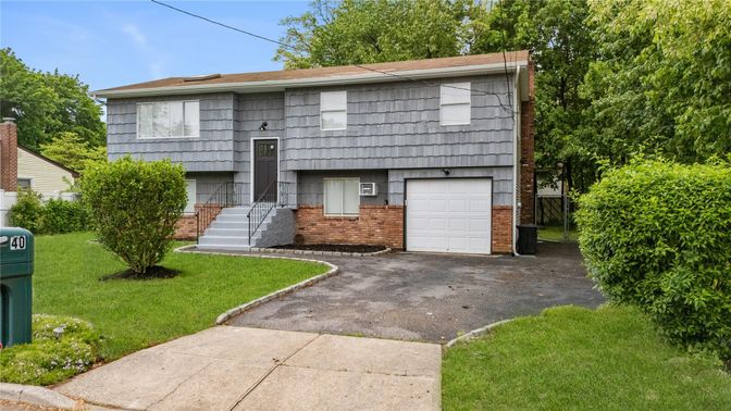 Attached, Exterior, Facade, Brick Facade, Raised Ranch