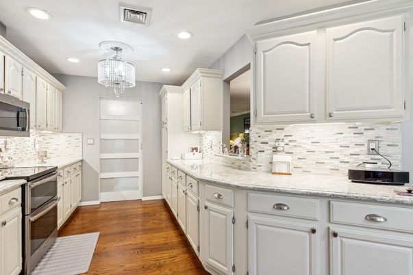 Chandelier, Interior, Kitchen, Recessed Lighting, Stainless Steel Appliances, Wood Texture Flooring