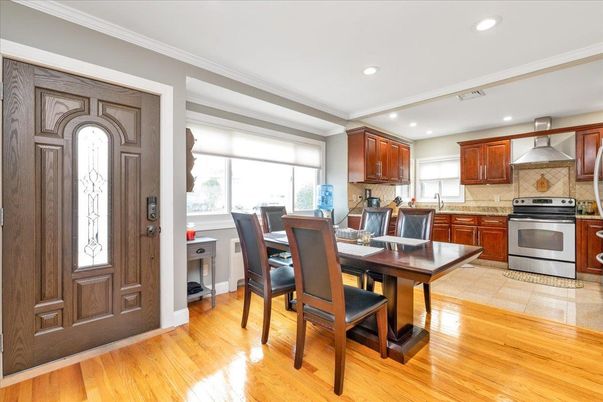 Dining room, Interior, Kitchen, Recessed Lighting, Stainless Steel Appliances, Wood Texture Flooring