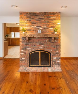 Fireplace, Interior, Recessed Lighting, Stone Walls, Wood Texture Flooring