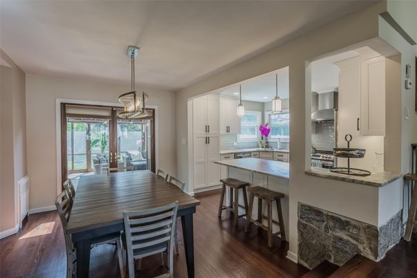 Dining room, Interior, Kitchen, Pendant Lights, Stainless Steel Appliances, Wood Texture Flooring