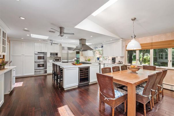 Dining room, Interior, Kitchen, Pendant Lights, Recessed Lighting, Stainless Steel Appliances, Wood Texture Flooring