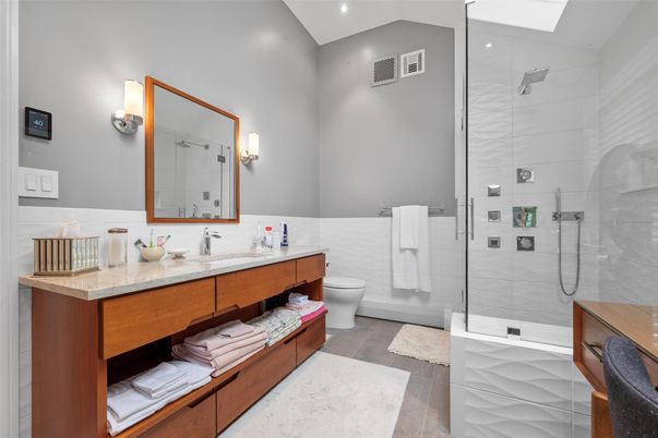 Bathroom, Dual Sink Vanities, Glass Shower, Interior, Recessed Lighting, Wood Texture Flooring