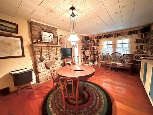 Dining room, Fireplace, Interior, Living room, Pendant Lights, Wood Texture Flooring