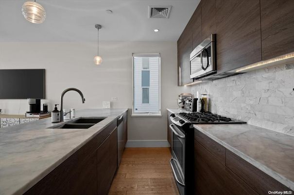 Interior, Kitchen, Marble Walls, Pendant Lights, Recessed Lighting, Wood Texture Flooring
