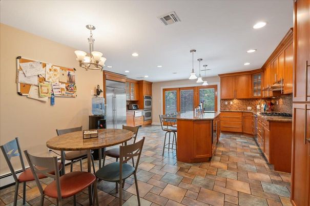 Chandelier, Dining room, Interior, Kitchen, Pendant Lights, Recessed Lighting, Stainless Steel Appliances