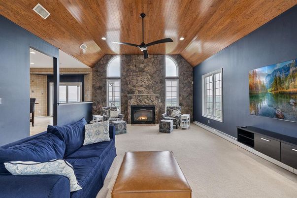 Fireplace, Interior, Living room, Recessed Lighting, Stone Walls, Wooden Ceilings