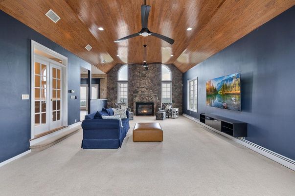 Fireplace, Interior, Living room, Recessed Lighting, Stone Walls, Wooden Ceilings