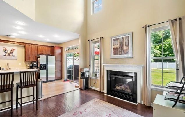 Fireplace, Interior, Kitchen, Recessed Lighting, Stainless Steel Appliances, Wood Texture Flooring