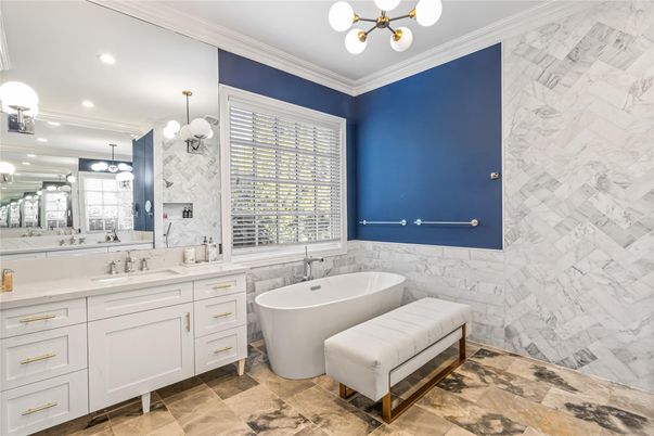 Bathroom, Dual Sink Vanities, Free Standing Baths, Interior, Marble Walls, Pendant Lights, Recessed Lighting