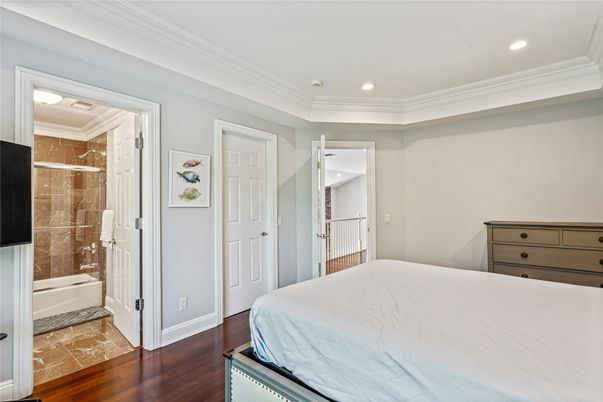 Bathroom, Bedroom, Glass Shower, Interior, Recessed Lighting, Wood Texture Flooring