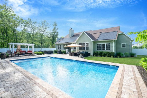 Exterior, Pool, Solar Panels