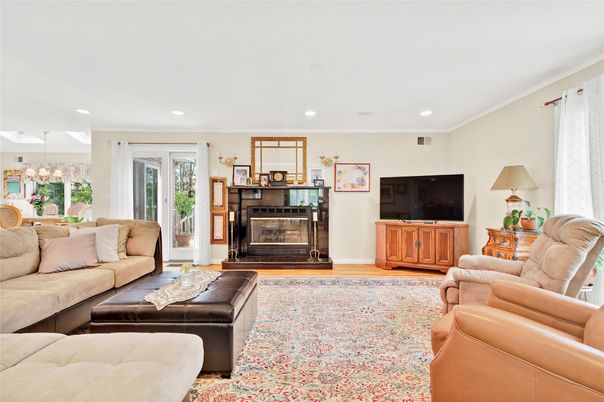 Chandelier, Dining room, Fireplace, Interior, Living room, Recessed Lighting, Wood Texture Flooring