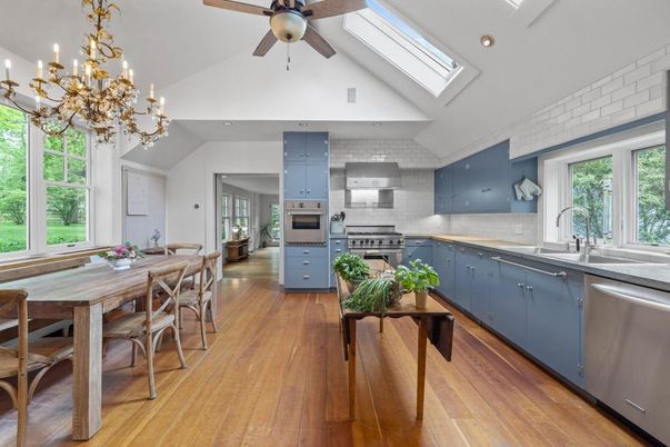 Chandelier, Dining room, Interior, Kitchen, Recessed Lighting, Stainless Steel Appliances, Wood Texture Flooring