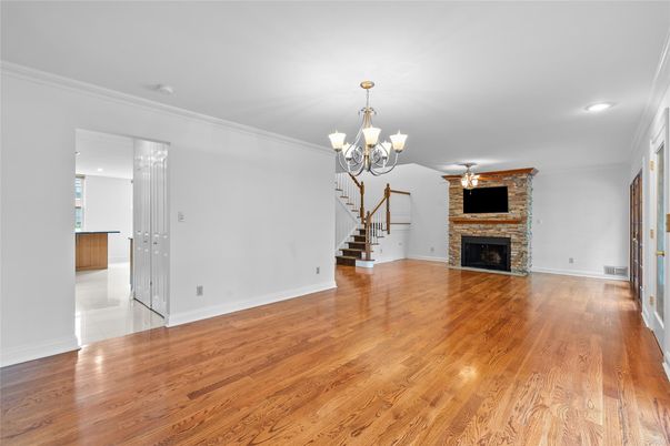Chandelier, Empty room, Fireplace, Interior, Recessed Lighting, Wood Texture Flooring