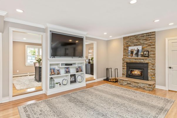 Fireplace, Interior, Recessed Lighting, Stone Walls, Wood Texture Flooring