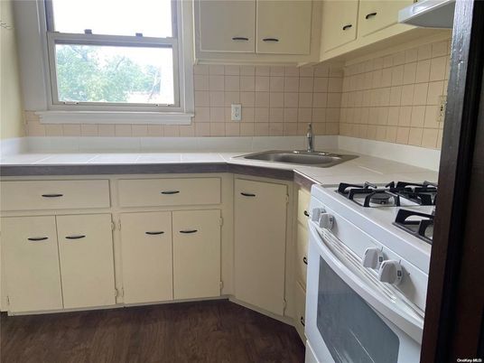 Interior, Kitchen, Tile Countertops, Wood Texture Flooring