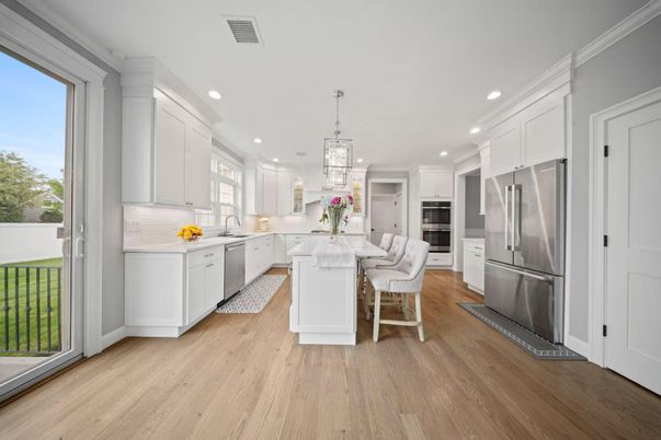 Chandelier, Dining room, Interior, Kitchen, Pendant Lights, Recessed Lighting, Stainless Steel Appliances, Wood Texture Flooring